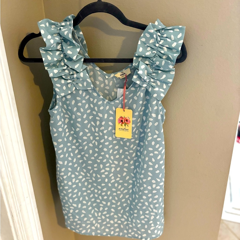 Never worn ruffle strap top.